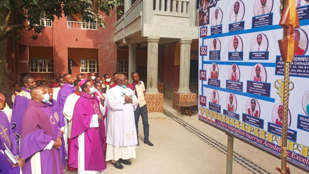 The Bishop unveils the academic board of excellence.