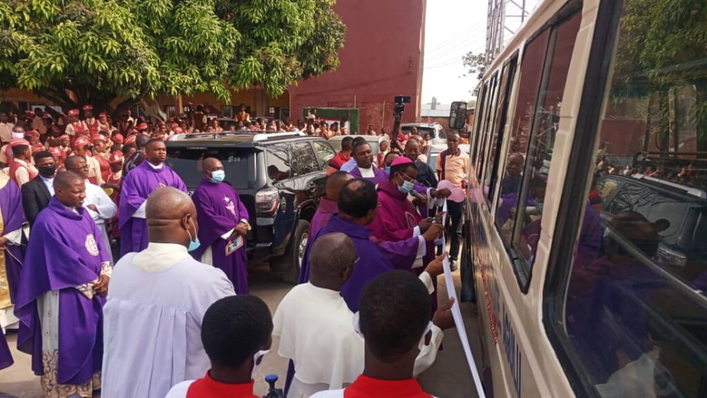 The Bishop Commissions the new school bus.